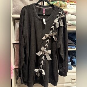 Adore Me Sparkly Black Top with Bows